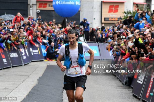 Second-placed Spanish athlete and former Mount Blanc Ultra Trail winner, Kilian Jornet, runs towards the finish line of the 15th edition of the UTMB,...