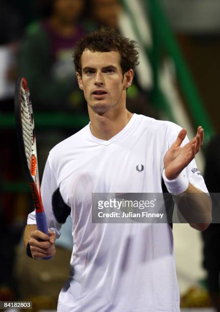 Andy Murray of Great Britain thanks the support after winning in his match against Albert Montanes of Spain during the Exxon Mobil Qatar Open Tennis...