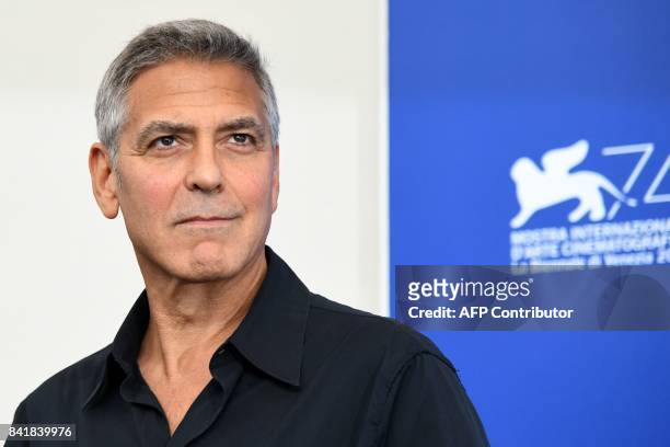 Actor and director George Clooney attends the photocall of the movie "Suburbicon" presented out of competition at the 74th Venice Film Festival on...