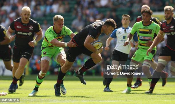 Duncan Taylor of Saracens breaks through to set up the second try during the Aviva Premiership match between Saracens and Northampton Saints at...