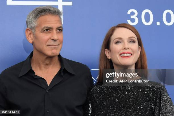 Actess Julianne Moore and US actor and director George Clooney attend the photocall of the movie "Suburbicon" presented out of competition at the...