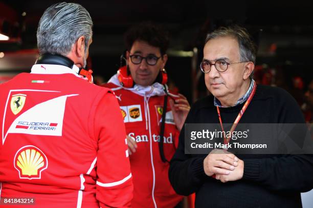 Sergio Marchionne, CEO of FIAT and Chairman of Ferrari looks on from the garage during qualifying for the Formula One Grand Prix of Italy at...