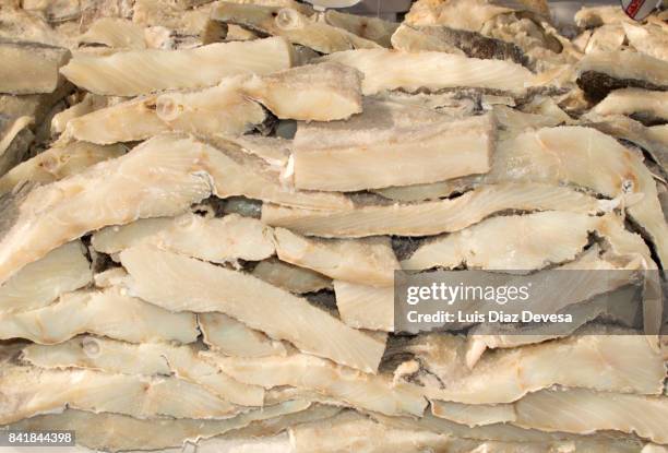 sale of slices of salted cod fish - cod stock pictures, royalty-free photos & images