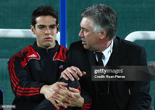 Kaka of AC Milan speaks with Carlo Ancelotti , manager of AC Milan before the Dubai Football Challenge match between AC Milan and Hamburger SV at The...