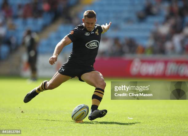 Jimmy Gopperth of Wasps kicks to convert a try during the Aviva Premiership match between Wasps and Sale Sharks at The Ricoh Arena on September 2,...