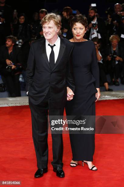 Robert Redford and Sibylle Szaggars walk the red carpet ahead of the 'Our Souls At Night' screening during the 74th Venice Film Festival at Sala...