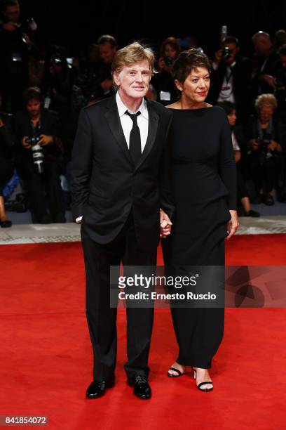 Robert Redford and Sibylle Szaggars walk the red carpet ahead of the 'Our Souls At Night' screening during the 74th Venice Film Festival at Sala...