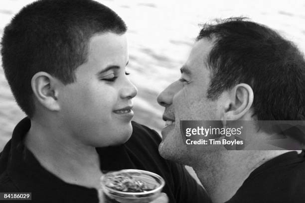 In this handout from Rogers and Cowan, Jett Travolta is seen with his father, actor John Travolta in this undated picture. Jett Travolta was...