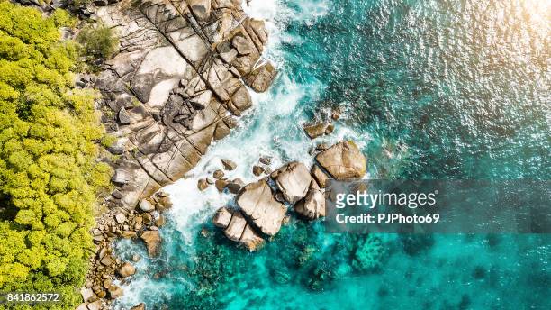 aerial view of coastline -  anse royale - mahe island - seychelles - pjphoto69 stock pictures, royalty-free photos & images