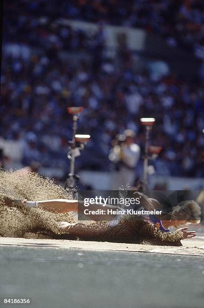 Summer Olympics: East Germany Heike Drechsler in action, landing in sand pit during Long Jump at Olympic Stadium. Seoul, South Korea 9/29/1988...