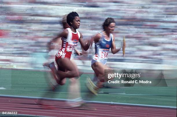 Summer Olympics: USA Evelyn Ashford in action vs East Germany Marlies Gohr during 4x100M Final at Olympic Stadium. USA won gold medal. Blur. Seoul,...