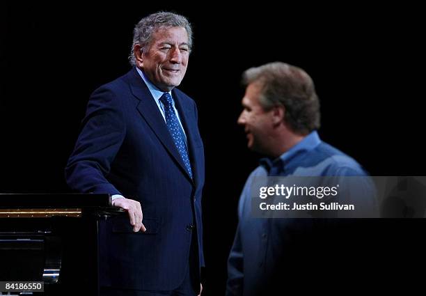 Singer Tony Bennett smiles at Apple Senior Vice President of Worldwide Marketing Philip Schiller during the keynote address at the MacWorld...