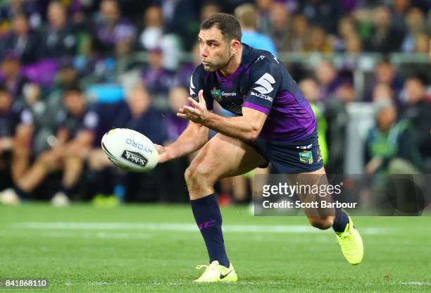 Cameron Smith of the Storm runs with the ball during the round 26 NRL match between the Melbourne Storm and the Canberra Raiders at AAMI Park on...