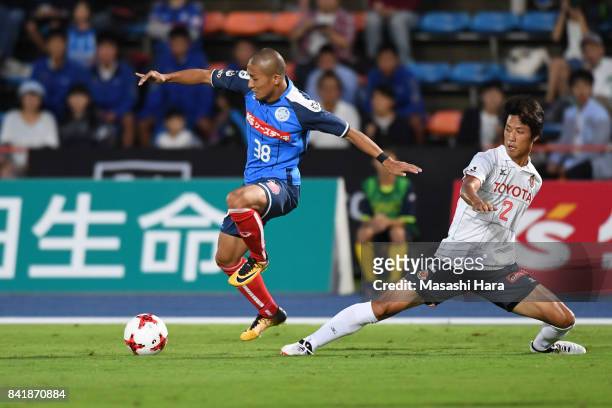 Daizen Maeda of Mito Hollyhock and Ikki Arai of Nagoya Grampus compete for the ball during the J.League J2 match between Mito Hollyhock and Nagoya...
