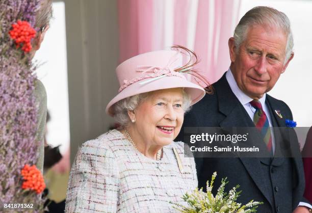 Queen Elizabeth II and Prince Charles, Prince of Wales attend the 2017 Braemar Highland Gathering at The Princess Royal and Duke of Fife Memorial...