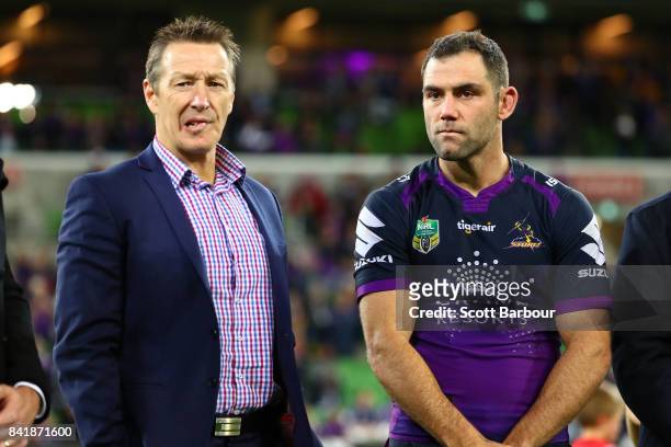 Storm coach Craig Bellamy and Cameron Smith of the Storm look on after the round 26 NRL match between the Melbourne Storm and the Canberra Raiders at...