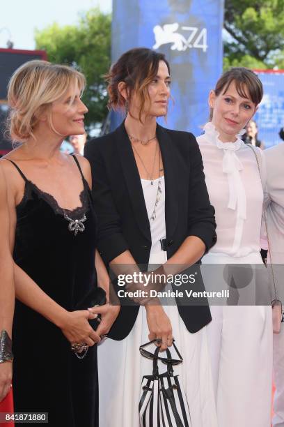 Isabella Ferrari, Anna Foglietta and Barbora Bobulova from the movie "Diva!" walk the red carpet ahead of the 'Foxtrot' screening during the 74th...