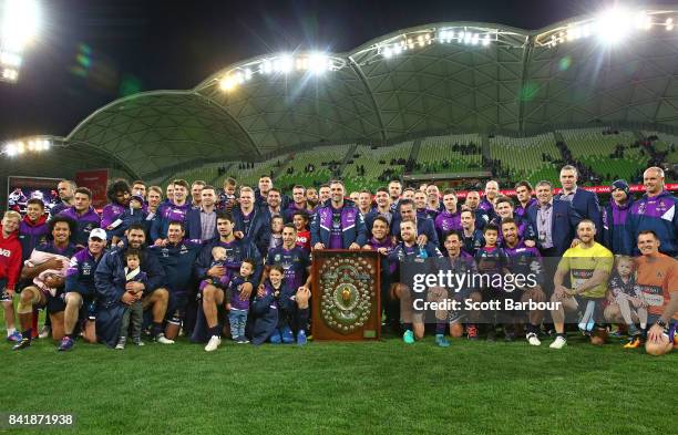 Cameron Smith and the Storm pose with the JJ Giltinan Shield as minor premiers after winning the round 26 NRL match between the Melbourne Storm and...