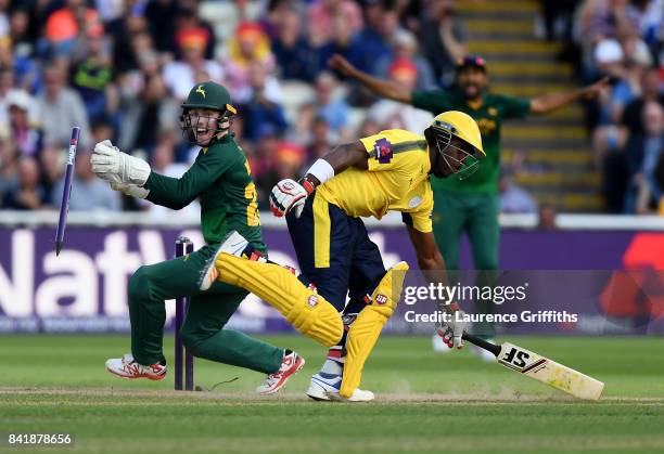 Michael Carberry of Hampshire is run out after a direct hit from Samit Patel of Notts during the NatWest T20 Blast Semi-Final match between Hampshire...