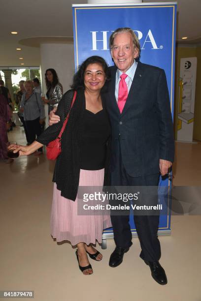 Meher Tatna and Donald Sutherland attend the 'Hollywood Foreign Press Association Cocktail Party' during the 74th Venice Film Festival on September...