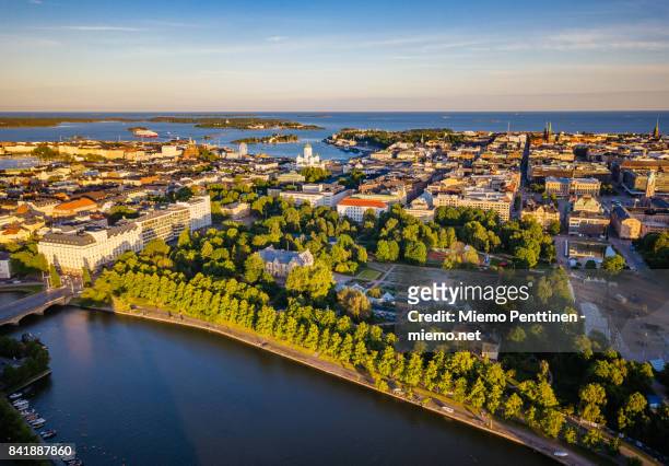 aerial view to kaisaniemi district and downtown helsinki by sunset in summer - finnland stock-fotos und bilder