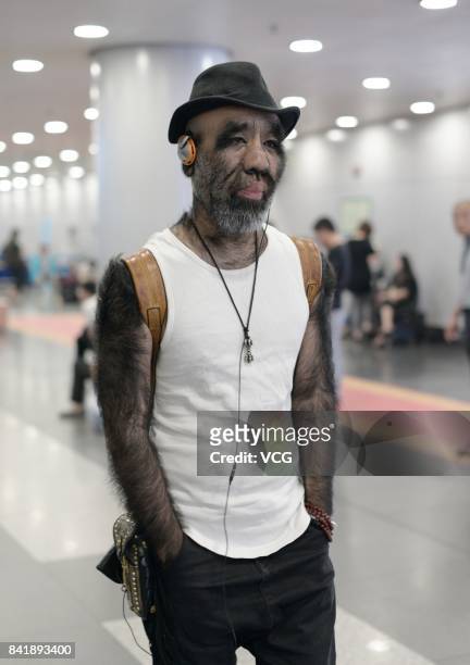 China's hairiest man Yu Zhenhuan is seen at an airport on June 13, 2017 in Beijing, China.