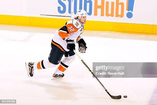 Brendan Witt of the New York Islanders skates the puck up ice against the Phoenix Coyotes on January 2, 2009 at Jobing.com Arena in Glendale, Arizona.