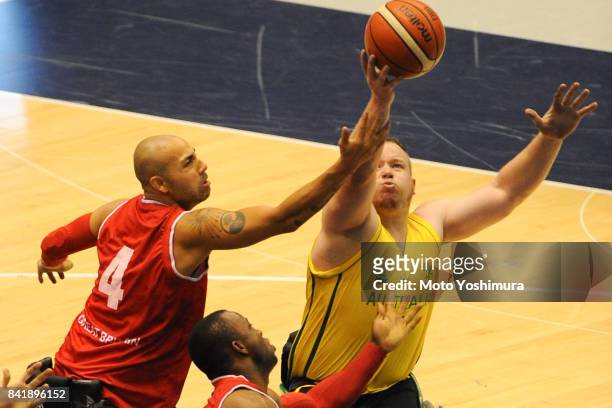Shaun Norris of Australia and Ghazian Choudhry Great Britain compete for the ball during the Wheelchair Basketball World Challenge Cup final between...