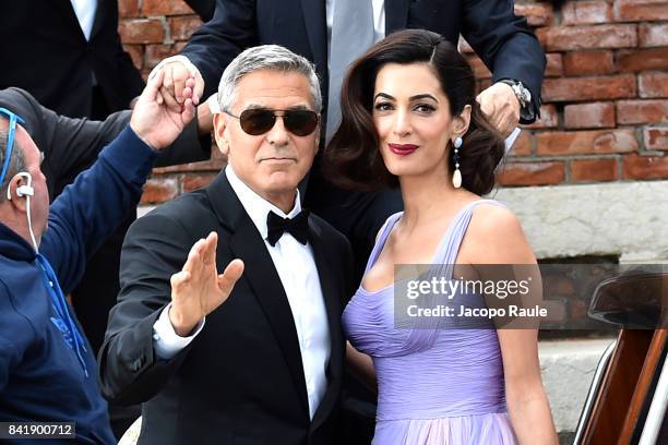 George Clooney and Amal Clooney are seen leaving Hotel Cipriani during the 74. Venice Film Festival on September 2, 2017 in Venice, Italy.