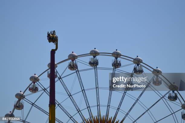 People enjoy their holiday by visiting the Genclik Park and its amusement park on the second day of Muslims' sacrificial festival Eid al-Adha in...