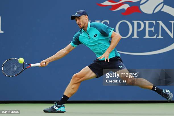 John Millman of Australia returns a shot against Philipp Kohlschreiber of Germany during their Men's Singles third round match on Day Six of the 2017...