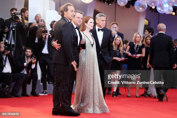 Alexander Desplat, Matt Damon, Julianne Moore and George Clooney walk the red carpet ahead of the 'Suburbicon' screening during the 74th Venice Film...