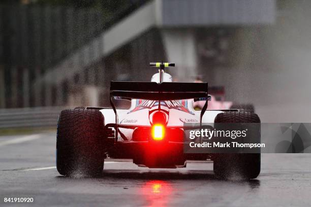 Lance Stroll of Canada driving the Williams Martini Racing Williams FW40 Mercedes leaves the pitlane during qualifying for the Formula One Grand Prix...