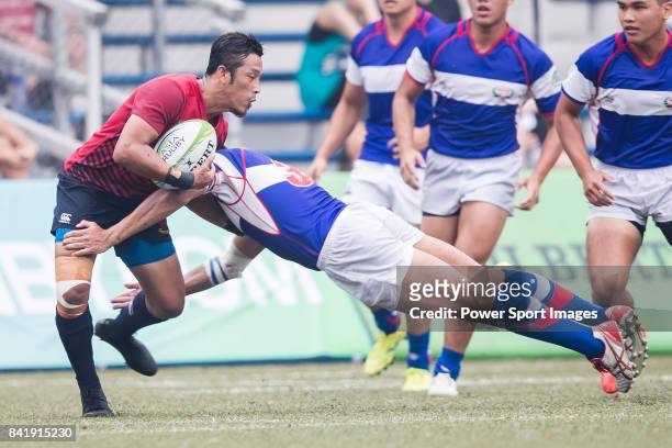 Nazreen Nasrudin of Malaysia is tackled by Wei-te Yeh of Chinese Taipei during the Asia Rugby Men's Sevens 2017 7th / 8th Play Off Final match...