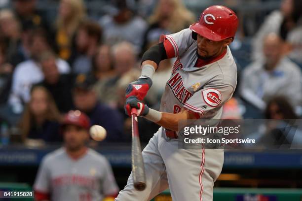 Cincinnati Reds center fielder Billy Hamilton singles on a line drive in the first inning during a MLB game between the Pittsburgh Pirates and the...