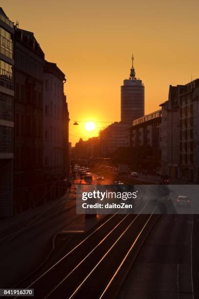 view over landsberger strasse with tramway tracks at sunset, munich, bavaria, germany, europe - silhouette münchen stock pictures, royalty-free photos & images