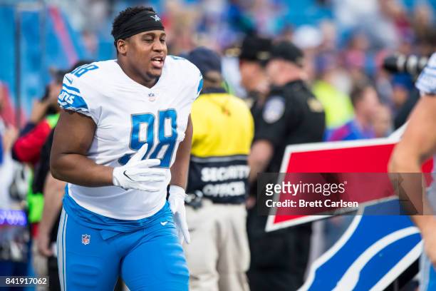Jeremiah Ledbetter of the Detroit Lions runs onto the field before the preseason game against the Buffalo Bills on August 31, 2017 at New Era Field...