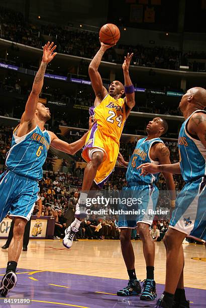 Kobe Bryant of the Los Angeles Lakers shoots against Tyson Chandler of the New Orleans Hornets at Staples Center on January 6, 2009 in Los Angeles,...