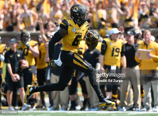 Mon Moore of the Missouri Tigers runs for a touchdown against the Missouri State Bears in the second quarter at Memorial Stadium on September 2, 2017...