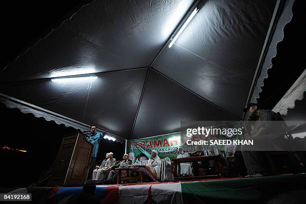 Malaysia's opposition leader Anwar Ibrahim adresses a by-election rally in the northeastern Terengganu state on January 6, 2009. Anwar renewed with...