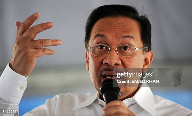 Malaysia's opposition leader Anwar Ibrahim speaks at a meeting in the northeastern Terengganu state on January 7, 2009. Anwar renewed with vigour his...