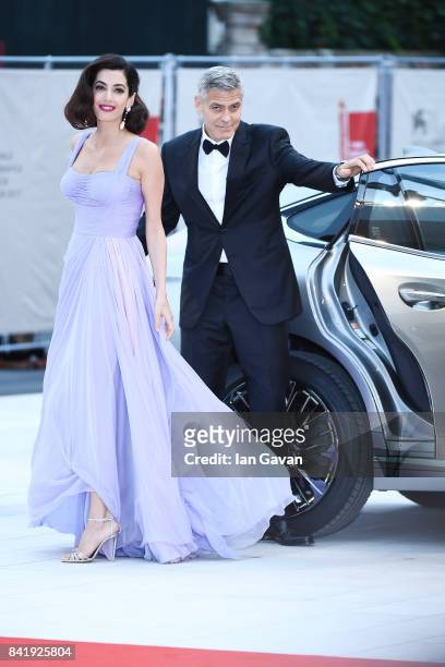 George Clooney and Amal Clooney walk the red carpet ahead of the 'Suburbicon' screening during the 74th Venice Film Festival at Sala Grande on...