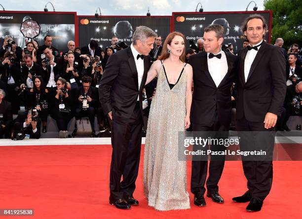 George Clooney, Julianne Moore, Alexander Desplat and Matt Damon walk the red carpet ahead of the 'Suburbicon' screening during the 74th Venice Film...