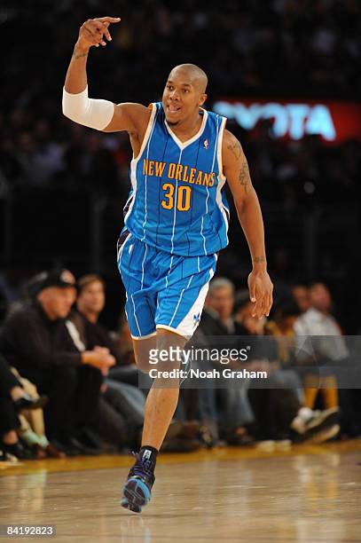 David West of the New Orleans Hornets reacts after making a shot against the Los Angeles Lakers at Staples Center on January 6, 2009 in Los Angeles,...