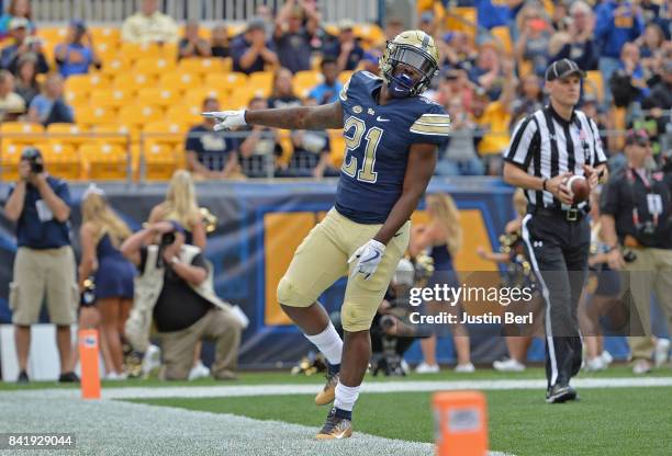 Davis of the Pittsburgh Panthers celebrates after rushing for a 1 yard touchdown in the second quarter during the game against the Youngstown State...