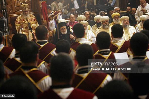 Pope Shenuda III , Head of the Egyptian Coptic Orthodox Church, leads the Coptic Christmas midnight mass in Cairo late on January 6,2009. Pope...