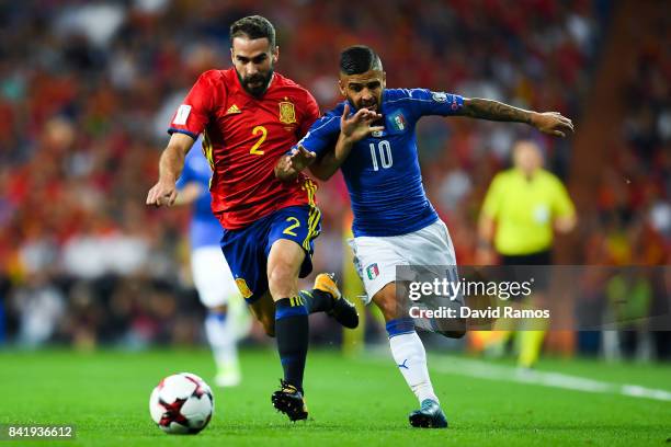 Lorenzo Insigne of Italy competes for the ball with Daniel Carvajal of Spain during the FIFA 2018 World Cup Qualifier between Spain and Italy at...