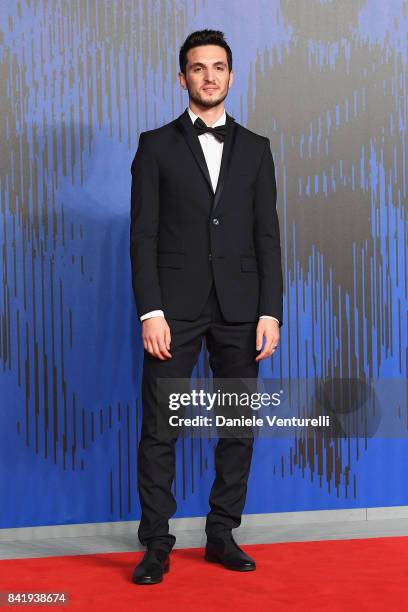 Giacomo Ferrara walks the red carpet ahead of the 'Suburra. La Serie' screening during the 74th Venice Film Festival at Sala Giardino on September 2,...