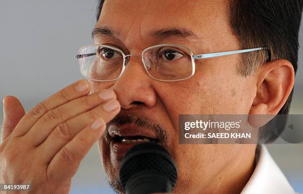 Malaysia's opposition leader Anwar Ibrahim speaks at a meeting in the northeastern Terengganu state on January 7, 2009. Anwar renewed with vigour his...