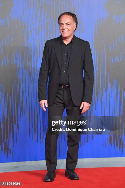 Francesco Acquaroli walks the red carpet ahead of the 'Suburra. La Serie' screening during the 74th Venice Film Festival at Sala Giardino on...